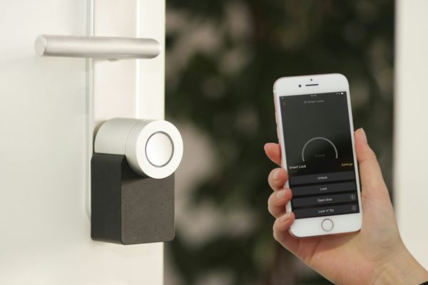 Smart door lock controlled through a mobile phone